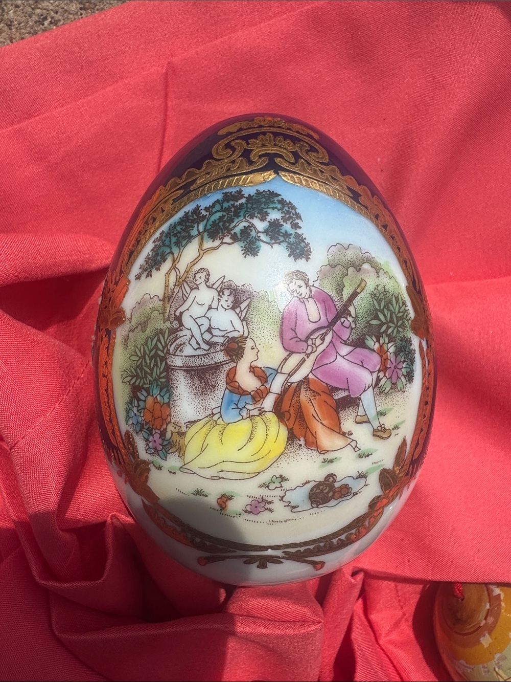 Hand-Painted Porcelain Decorative Egg - Multicolor with Gold Accents